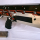 Ilustración para el artículo titulado El rifle electromagnético ideal para destrozar portátiles